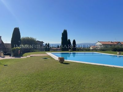 Ampio trilocale in residence con piscina